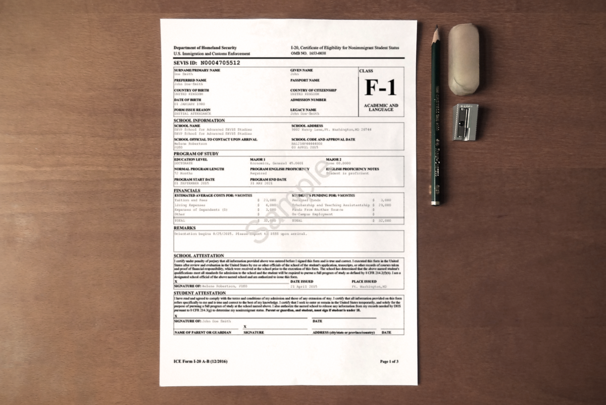 form I20 with a pencil, eraser and pencil sharpener on a table