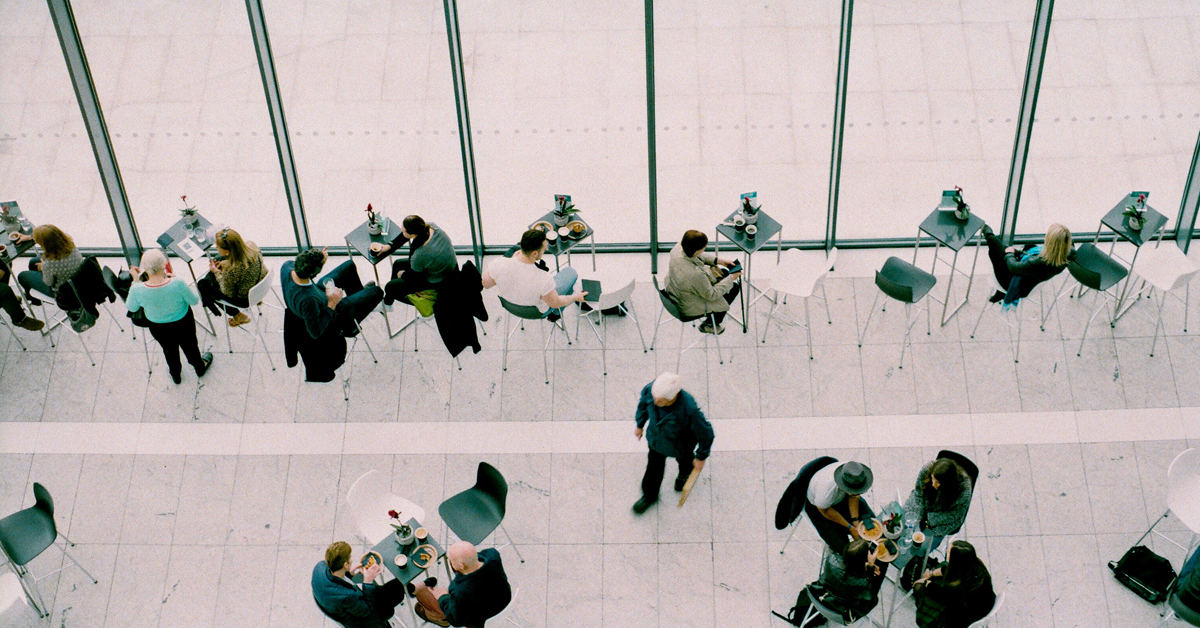 Birds eye view of people have international business meetings and lunches.
